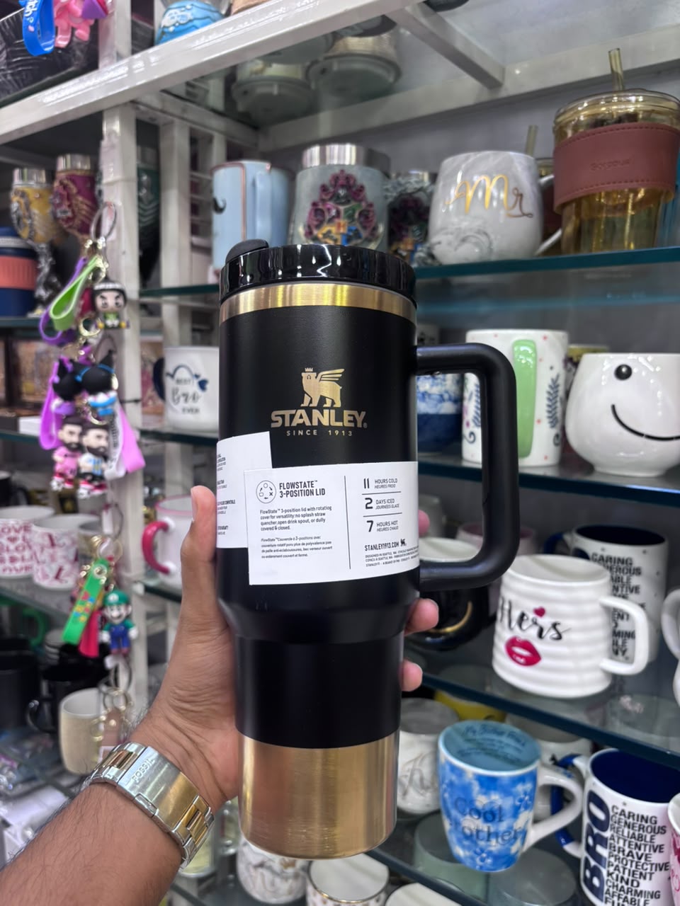 Stanley Quencher Flow state Gold Edition Stainless Steel Vacuum Insulated Tumbler (40 oz). Black
