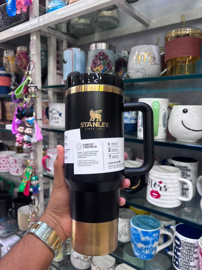 Stanley Quencher Flow state Gold Edition Stainless Steel Vacuum Insulated Tumbler (40 oz). Black