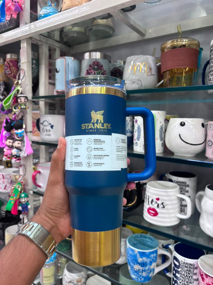 Stanley Quencher Flow state Gold Edition Stainless Steel Vacuum Insulated Tumbler (40 oz). Royal Blue