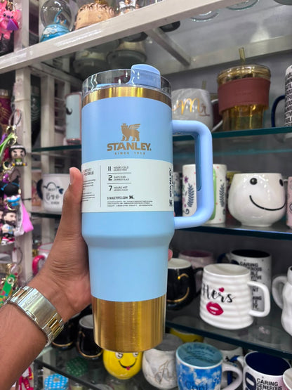 Stanley Quencher Flow state Gold Edition Stainless Steel Vacuum Insulated Tumbler (40 oz). Blue